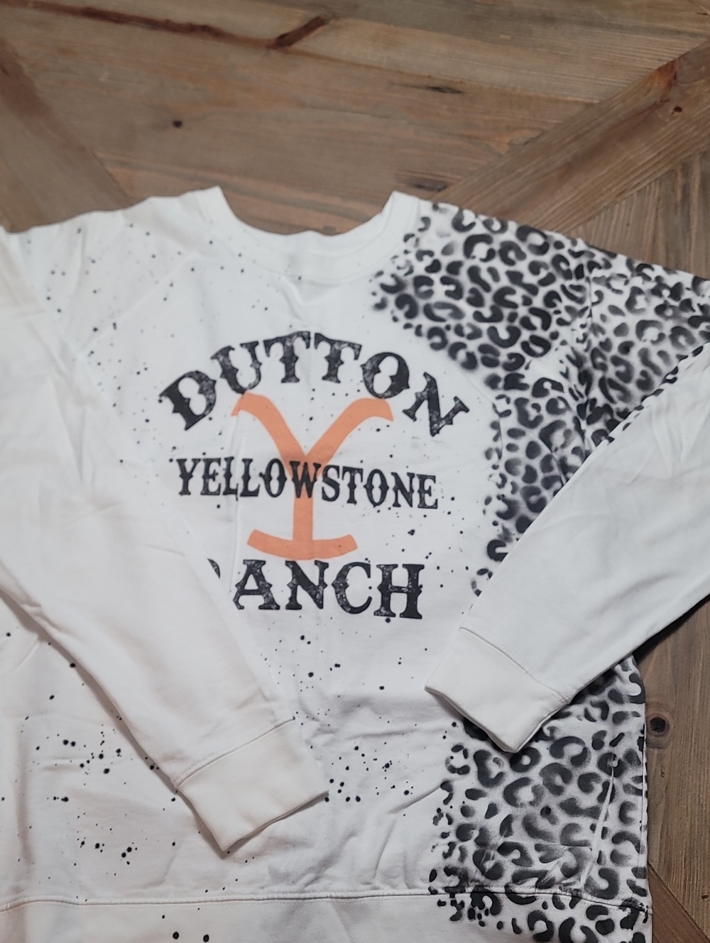 Yellowstone Womens Graphic Sweatshirt - White & Black with Orange Logo